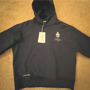 FRAME x RITZ collab hoodie. Brand New. Tags Attached. Size Med. Navy Blue Color.